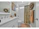 Bathroom with a mirror, sink, toilet, and shower at 816 Morrall Dr., North Myrtle Beach, SC 29582