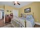 Bedroom features wood floors, a bed with pillows, and wooden furniture at 816 Morrall Dr., North Myrtle Beach, SC 29582