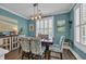 Dining room with stylish table, comfortable chairs and ample natural light at 816 Morrall Dr., North Myrtle Beach, SC 29582