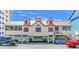 Charming beachside building featuring a red roof and ample parking. Perfect for coastal living at 816 Morrall Dr., North Myrtle Beach, SC 29582