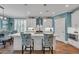 Stylish kitchen with white cabinets, a center island, and stainless steel appliances at 816 Morrall Dr., North Myrtle Beach, SC 29582