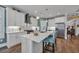 Well-equipped kitchen featuring white cabinets, a large island, and modern finishes at 816 Morrall Dr., North Myrtle Beach, SC 29582
