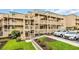 Charming exterior view of building featuring stairs and landscaping at 9661 Shore Dr. # B7-29, Myrtle Beach, SC 29572