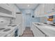 Well-equipped kitchen with white appliances and ample counter space at 9661 Shore Dr. # B7-29, Myrtle Beach, SC 29572