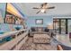 Comfortable living room featuring stylish furnishings and a sliding glass door to deck at 9661 Shore Dr. # B7-29, Myrtle Beach, SC 29572