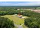 Aerial view of property with a sprawling lawn and home in a rural location at 971A Mcnabb Rd., Loris, SC 29569