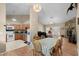 Cozy living area with connected dining room and kitchen with tile and wood floors at 971A Mcnabb Rd., Loris, SC 29569