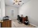Office with neutral walls, hardwood floor, a large window, office desk, and furnishings at 971A Mcnabb Rd., Loris, SC 29569