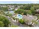 Aerial view showcasing the community pool, clubhouse, tennis courts, and residences at 9776 Leyland Dr. # 2, Myrtle Beach, SC 29572
