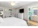 Cozy bedroom with a ceiling fan and ensuite bathroom at 9776 Leyland Dr. # 2, Myrtle Beach, SC 29572