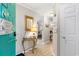 Bright entryway with tiled flooring, beach decor, and a stylish mirror welcomes guests at 9776 Leyland Dr. # 2, Myrtle Beach, SC 29572