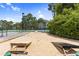 Recreational game area featuring cornhole boards and benches and lush green plants at 9776 Leyland Dr. # 2, Myrtle Beach, SC 29572