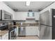 Efficient kitchen featuring modern appliances, granite countertops, and white cabinetry at 9776 Leyland Dr. # 2, Myrtle Beach, SC 29572