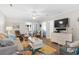 Bright living room with stylish decor, hardwood floors, and access to additional rooms at 9776 Leyland Dr. # 2, Myrtle Beach, SC 29572