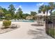 Inviting community pool area featuring lounge chairs, dining tables, and shaded seating areas at 9776 Leyland Dr. # 2, Myrtle Beach, SC 29572