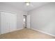 Bedroom featuring a double door closet and neutral color scheme with carpet at 110 Ashworth Dr., Little River, SC 29566
