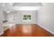 Inviting living room with hardwood floors and a view of the backyard at 110 Ashworth Dr., Little River, SC 29566