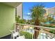 Inviting balcony with chairs overlooking the resort waterpark and ocean views at 1105 S Ocean Blvd. # 250, Myrtle Beach, SC 29577