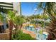 Exciting waterpark with splash pad and palm trees, perfect for Gathering fun at 1105 S Ocean Blvd. # 250, Myrtle Beach, SC 29577