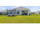 Backyard featuring a covered patio, grill, grassy area, trampoline, and fencing at 115 Spring Wheat Way, Conway, SC 29527