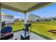 Backyard featuring a patio, grill, grassy area, and fencing for privacy at 115 Spring Wheat Way, Conway, SC 29527