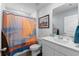 Clean bathroom with a shower/tub combination, white vanity, and a framed picture at 115 Spring Wheat Way, Conway, SC 29527
