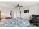 Bedroom featuring a ceiling fan, a workstation, and neutral-toned walls at 115 Spring Wheat Way, Conway, SC 29527
