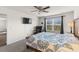 Comfortable bedroom with large windows and a ceiling fan at 115 Spring Wheat Way, Conway, SC 29527