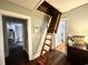 Hallway featuring pull down attic access and nice hardwood floors at 124 Orange St., Georgetown, SC 29440