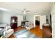 This bedroom features two cribs, pale blue walls and hardwood floors at 124 Orange St., Georgetown, SC 29440