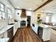 Modern kitchen with marble countertops, a stainless steel oven, and a stylish island with wine storage at 124 Orange St., Georgetown, SC 29440