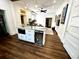 Open concept kitchen featuring a kitchen island with a microwave and wine cooler at 124 Orange St., Georgetown, SC 29440