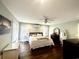 Primary bedroom with generous natural light, light ceiling fan, and neutral color palette at 124 Orange St., Georgetown, SC 29440