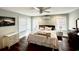 Primary bedroom with generous natural light, light ceiling fan, and neutral color palette at 124 Orange St., Georgetown, SC 29440