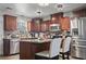 Modern kitchen with stainless steel appliances, granite counters, and ample cabinet space at 1300 Ragin St., Myrtle Beach, SC 29577