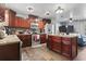 Large kitchen with stainless steel appliances, a center island, and ample cabinet space for storage at 1300 Ragin St., Myrtle Beach, SC 29577