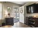 Inviting living room with hardwood floors, front door view, and comfortable decor at 1300 Ragin St., Myrtle Beach, SC 29577
