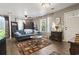 Living room with a cozy sofa and view of the entryway at 1300 Ragin St., Myrtle Beach, SC 29577