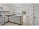 Functional kitchen offering natural light and views through to the adjacent dining and living areas at 1302 River Oak Dr. # 4B, Myrtle Beach, SC 29579