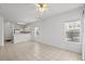 Bright living room with tile floors, neutral walls, and access to the kitchen at 1302 River Oak Dr. # 4B, Myrtle Beach, SC 29579