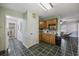 Eat-in kitchen features wood cabinets, stainless steel appliances, and tile flooring at 1342 Highway 90, Conway, SC 29526