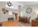 Dining area featuring hardwood floors, a chandelier, and an open layout at 161 Patriot Ln., Pawleys Island, SC 29585