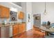 Kitchen with granite counters, stainless steel dishwasher, and a view into the breakfast nook at 161 Patriot Ln., Pawleys Island, SC 29585