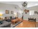 Spacious living room featuring vaulted ceilings, hardwood floors, and contemporary decor at 161 Patriot Ln., Pawleys Island, SC 29585