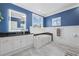 Bathroom with a large jacuzzi tub, double sink vanity and bright vanity lighting at 17 Trigger Fish Ln., Murrells Inlet, SC 29576
