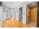 Bright foyer with hardwood floors, offering an elevator and access to other parts of the home at 17 Trigger Fish Ln., Murrells Inlet, SC 29576