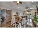 Bright dining area with a rustic dining table, hardwood floors, and a sliding barn door at 1737 24Th Ave. N, North Myrtle Beach, SC 29582