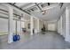 Spacious garage with epoxy flooring, overhead lighting, and room for multiple vehicles at 1737 24Th Ave. N, North Myrtle Beach, SC 29582