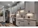 Bright kitchen showcases a farmhouse sink and sleek, stainless steel refrigerator at 1737 24Th Ave. N, North Myrtle Beach, SC 29582