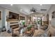Open-concept living area with hardwood floors, a modern fireplace, and plenty of natural light at 1737 24Th Ave. N, North Myrtle Beach, SC 29582